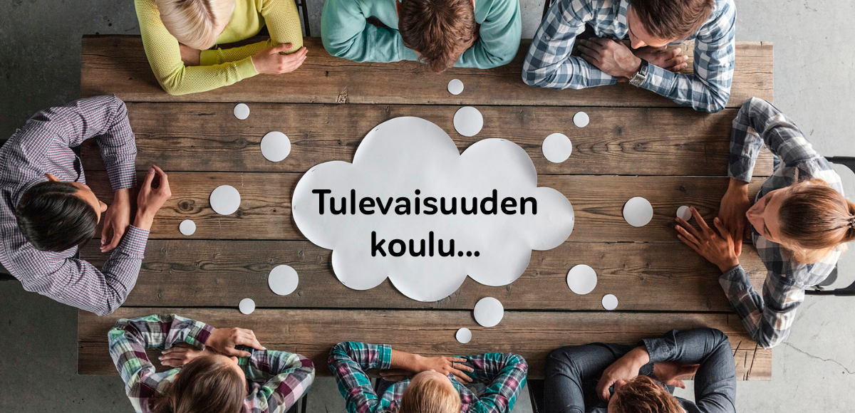 Pöydällä ajatuskupla, jossa lukee "tulevaisuuden koulu..."